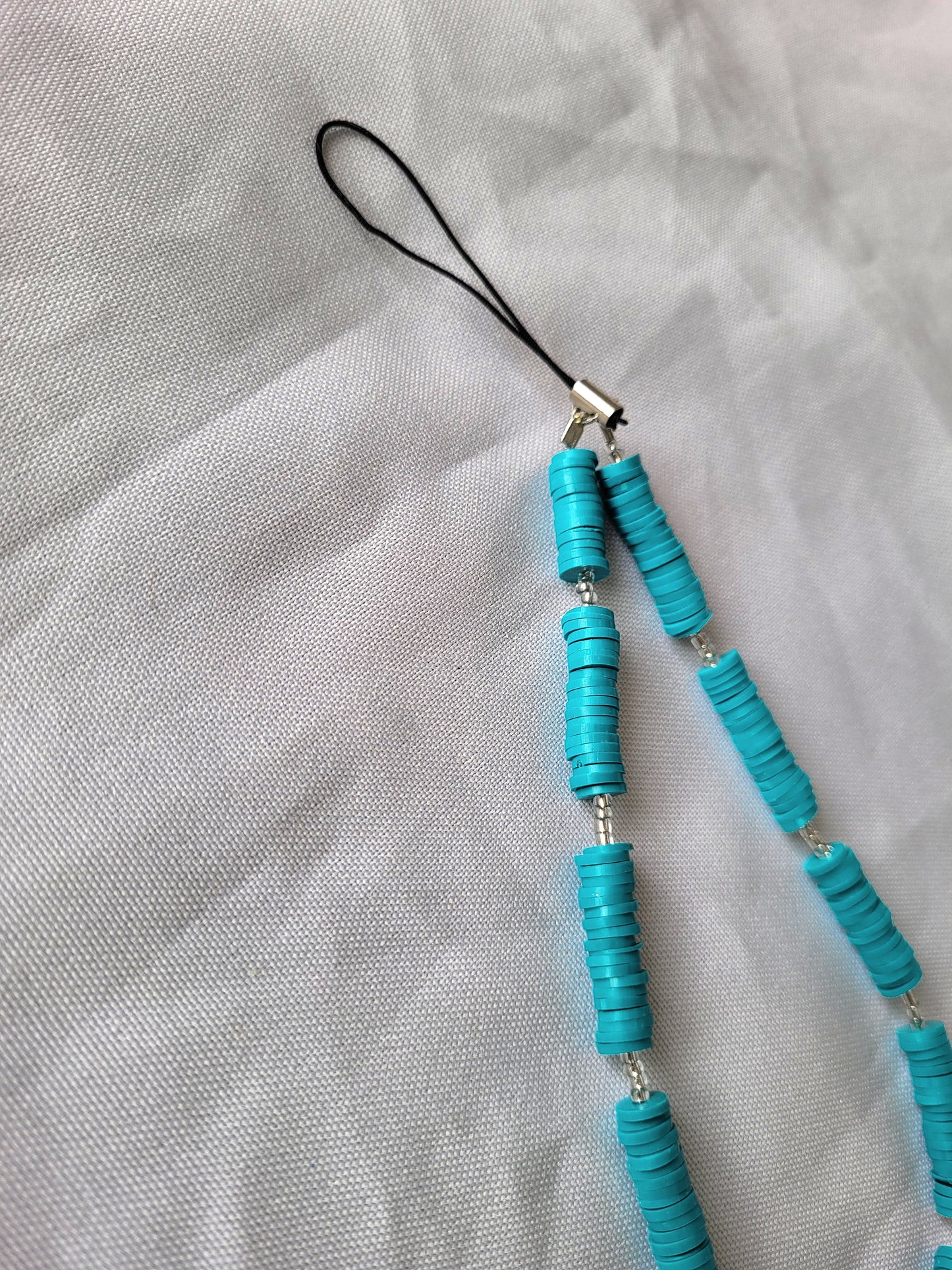 Bijoux de téléphone Bleu Heishi