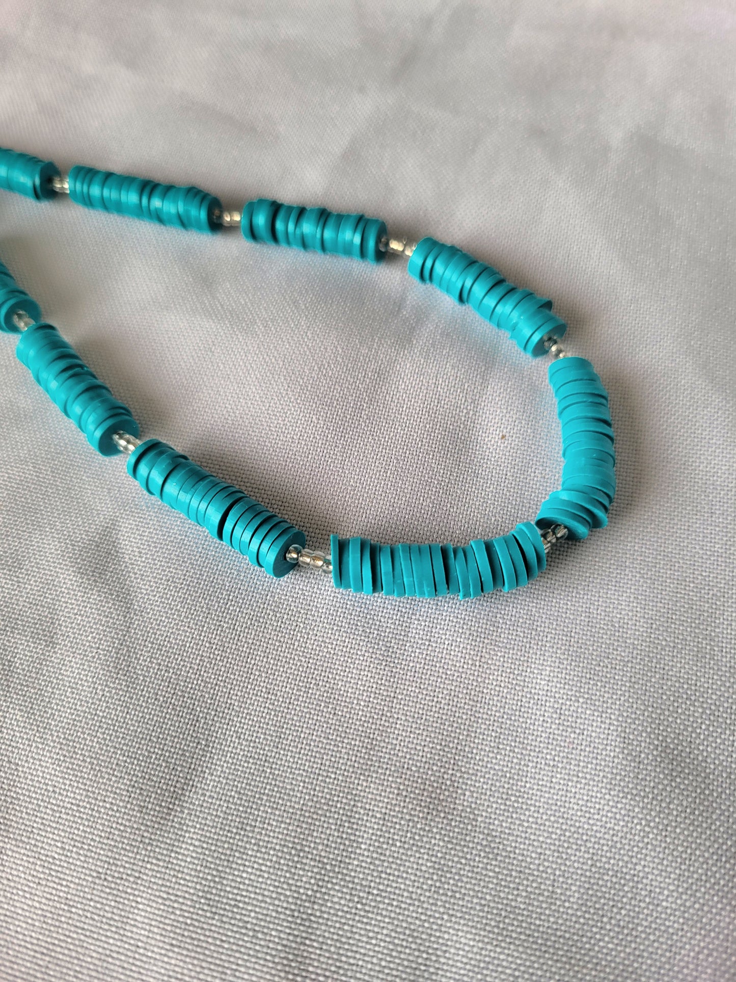 Bijoux de téléphone Bleu Heishi