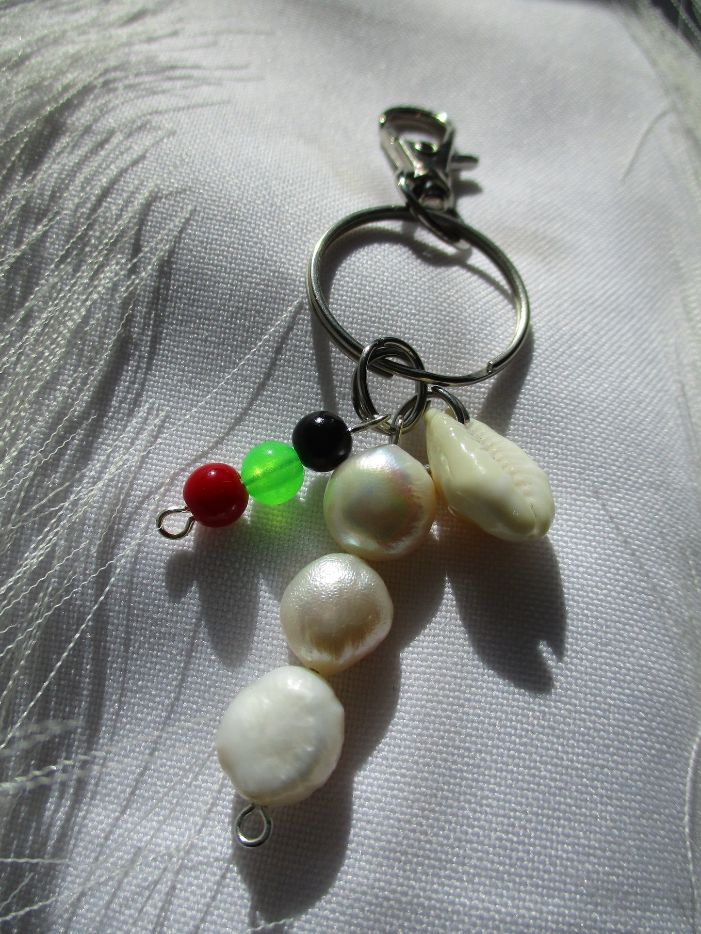 Porte-clef Rouge vert Noir Coquillage