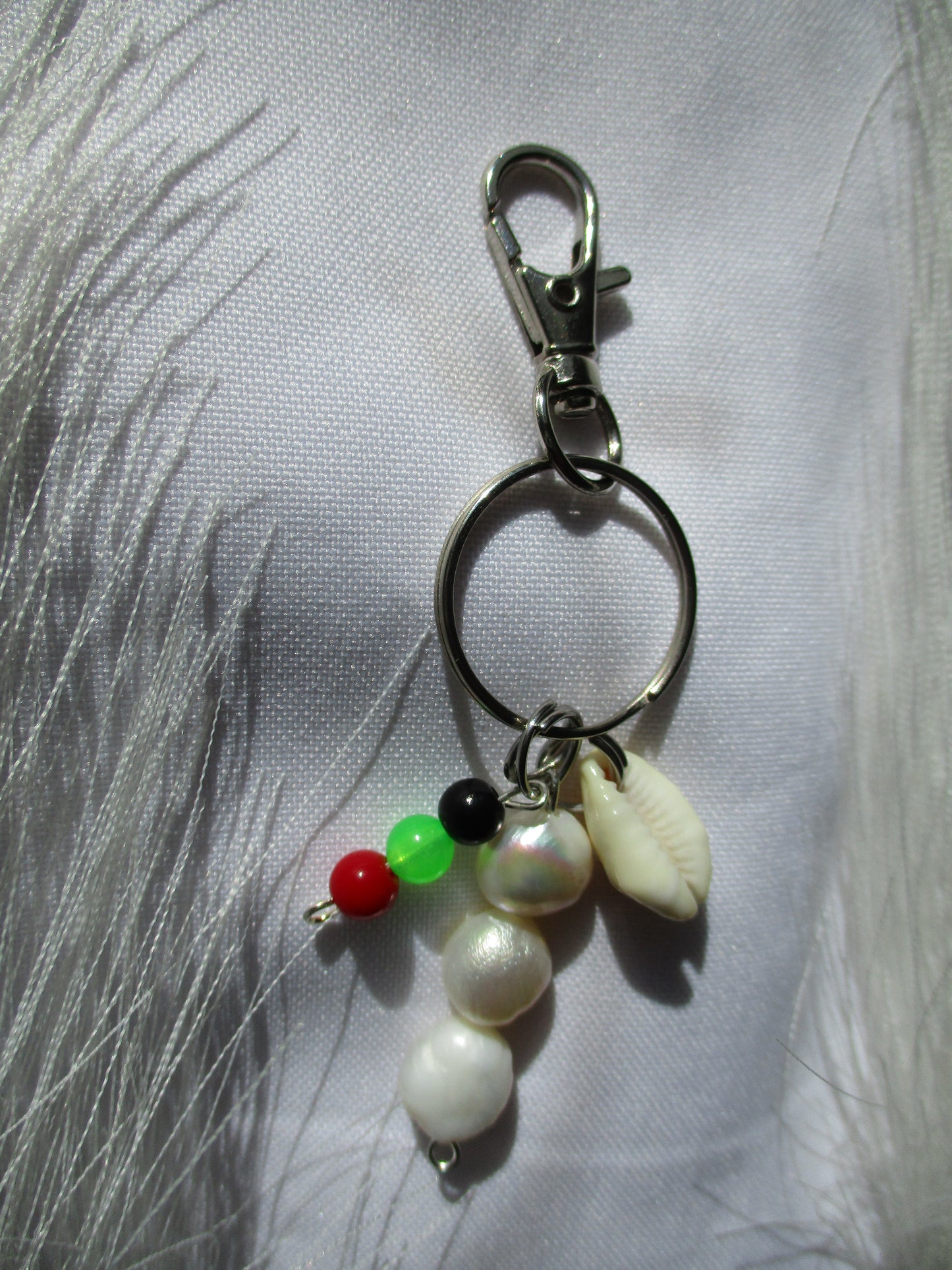 Porte-clef Rouge vert Noir Coquillage